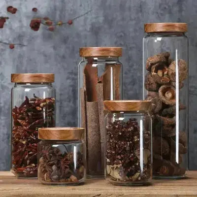 bocaux de conservation en verre avec couvercle en bois naturel
